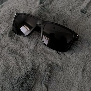 Oakley sunglasses. Holbrook style. Black frames with black lenses.